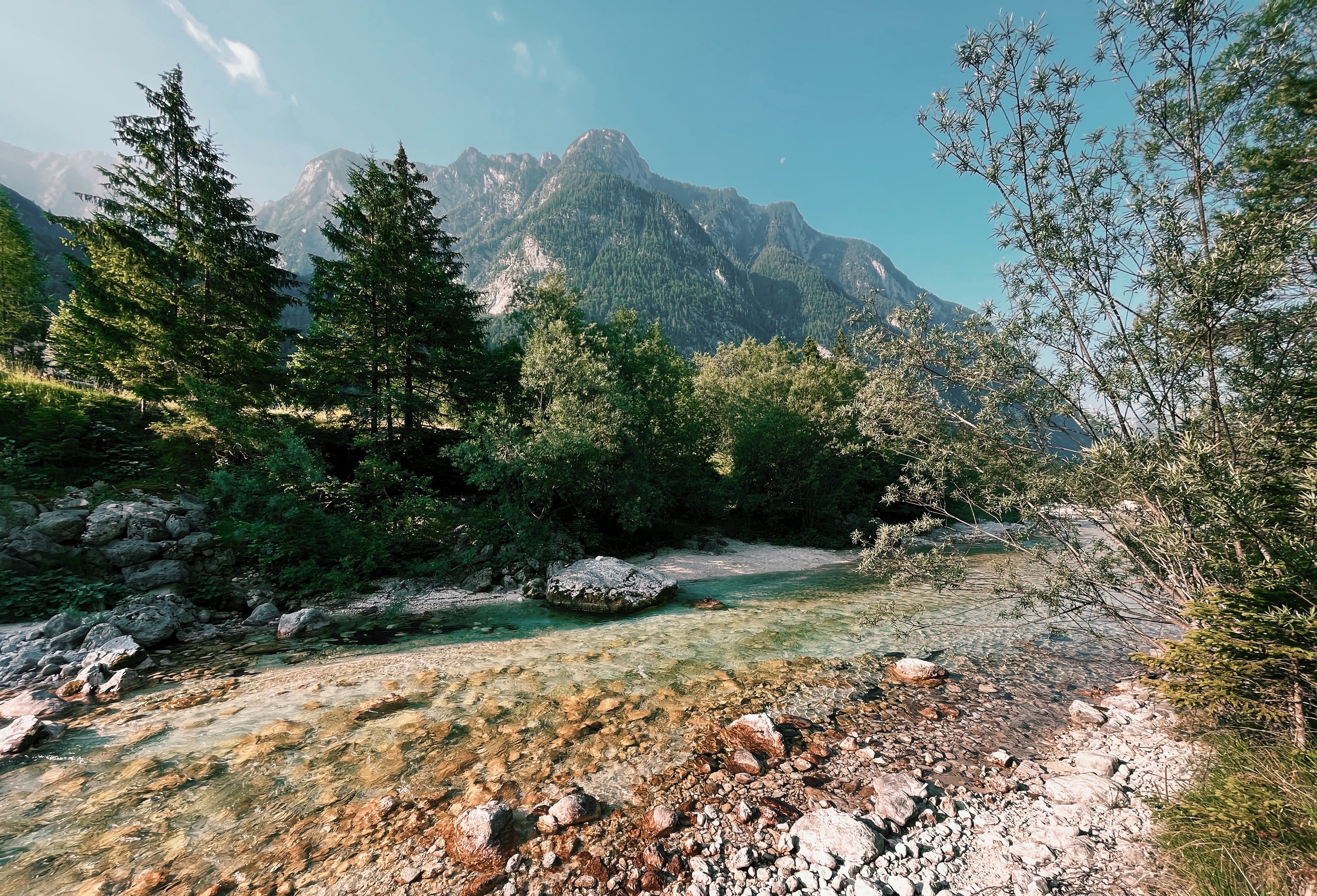 Soča River flowing through Soča Valley in Slovenia, Alpe Adria Trail